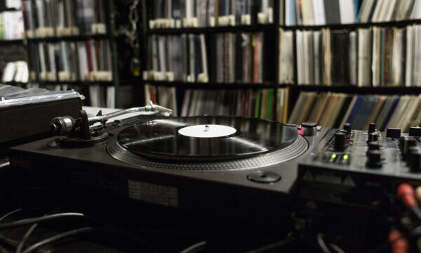 DJ Turntable Playing Vinyl at Record Store DJ Turntable Playing Vinyl at Record Store